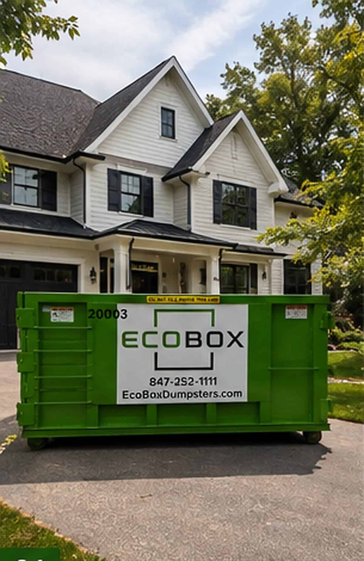 A roll-off dumpster on a suburban driveway during a household cleanout