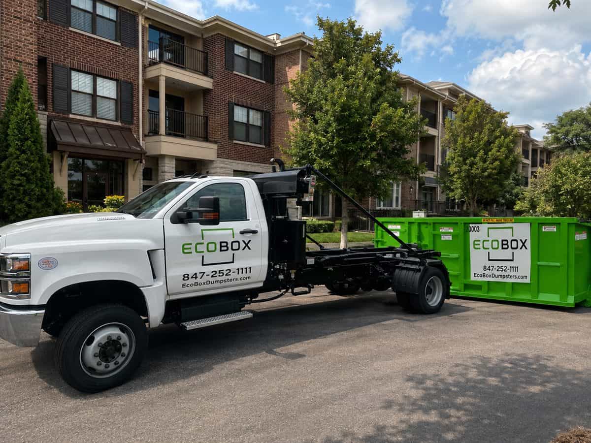 A roll-off dumpster at an apartment property