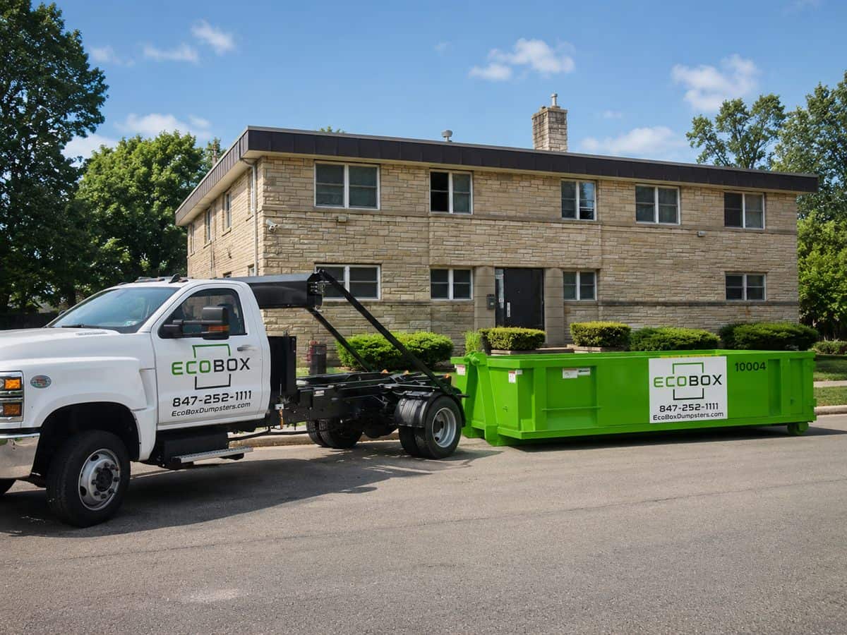 A roll-off dumpster at an apartment property