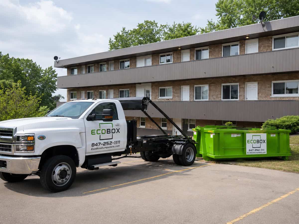 A roll-off dumpster at an apartment property